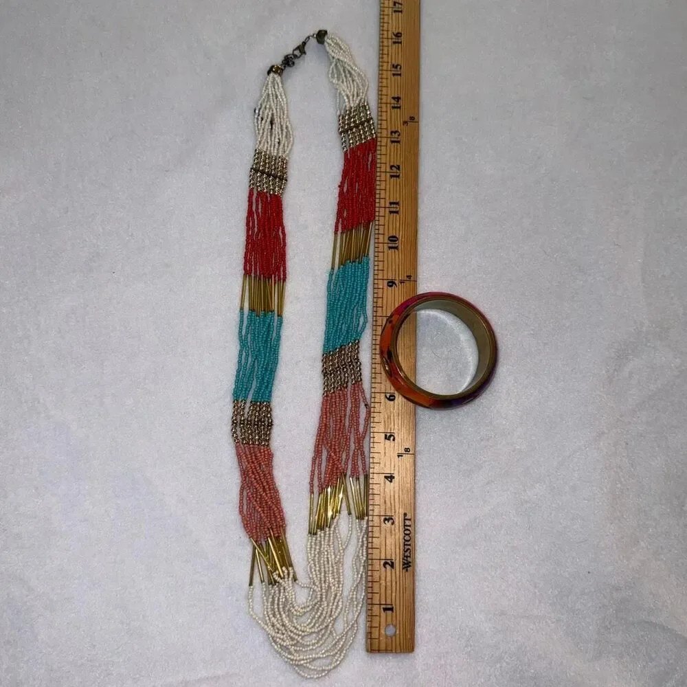 Vibrant multi-colored beaded necklace and bracelet bundle